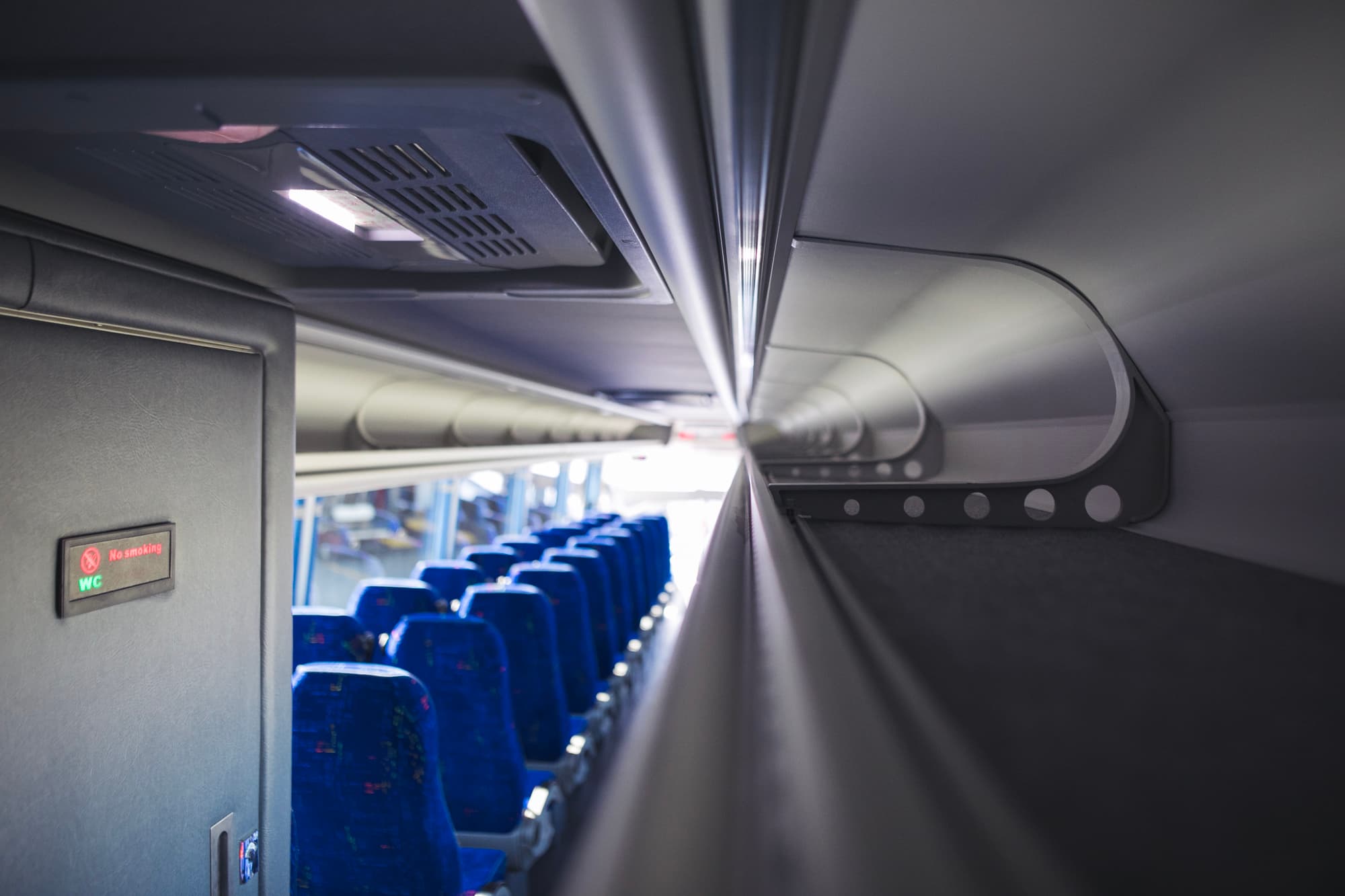 Aisle and seating inside a Horizons West coach