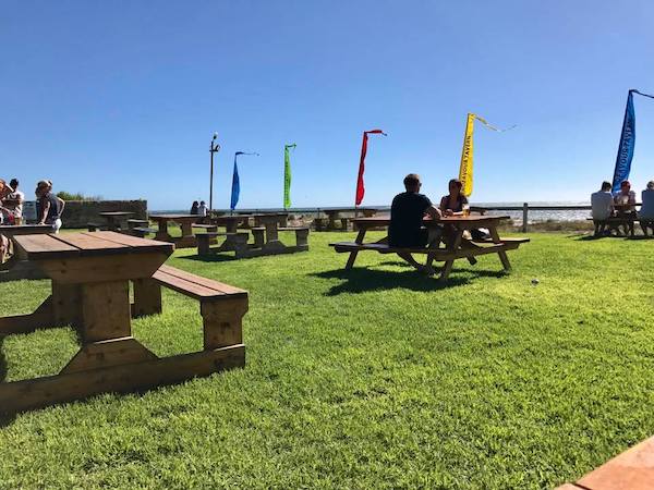 Lancelin pub and people sitting on chairs